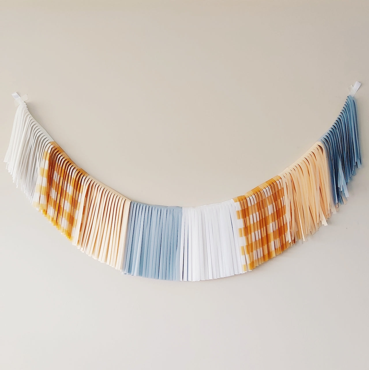 Guirnalda de flecos azul/mostaza vichy